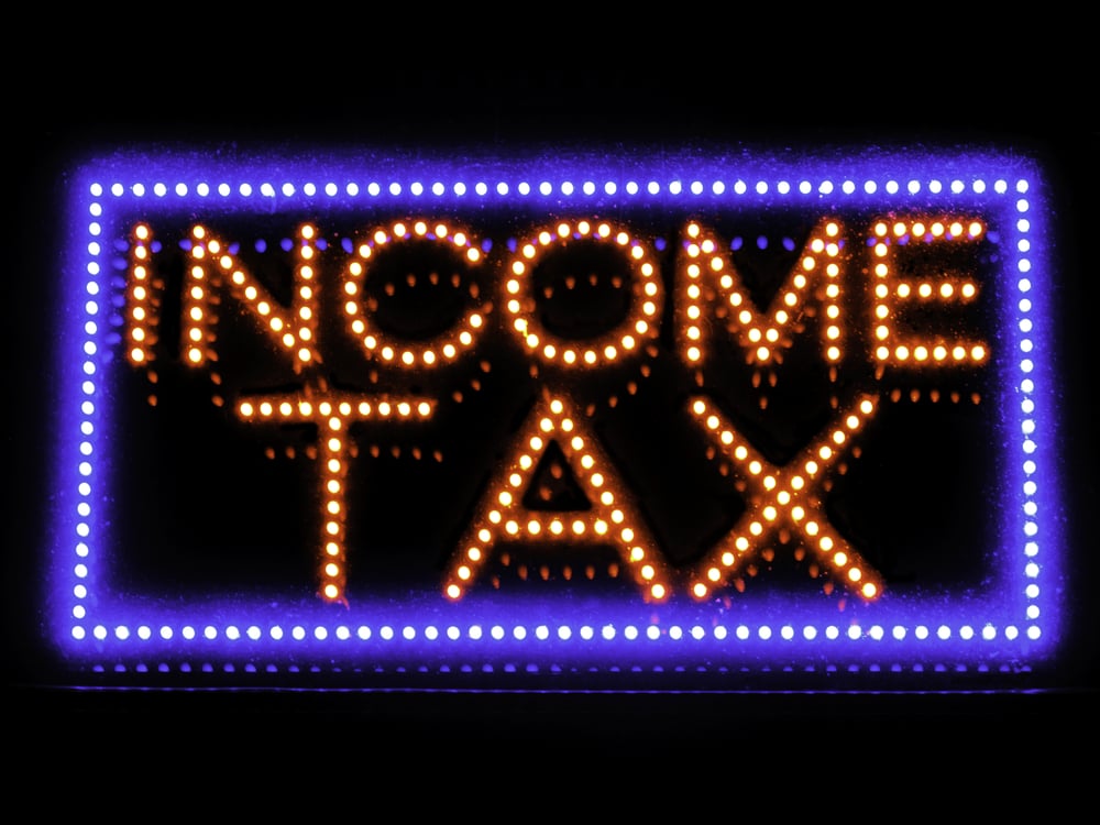 Neon sign in window of local accounting service-1